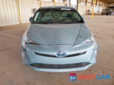Piąte zdjęcie samochodu w środku: 2016 TOYOTA PRIUS TWO VIN:JTDKBRFU8G3023309 - miniatura