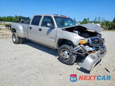 Czwarte zdjęcie samochodu z boku: 2005 GMC NEW SIERRA K3500 VIN:1GTJK33G85F816368 - miniatura