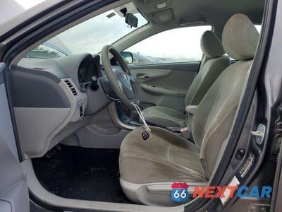 Zdjęcie 7 z 14 samochodu: 2009 TOYOTA COROLLA LE VIN:JTDBL40E09J021022 - miniatura