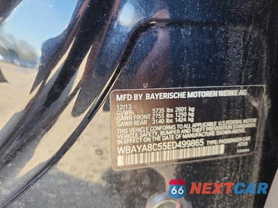Zdjęcie 12 z 12 samochodu: 2014 BMW 750 I VIN:WBAYA8C55ED499865 - miniatura