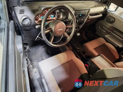 Zdjęcie 8 z 12 samochodu: 2010 JEEP WRANGLER SPORT VIN:1J4AA2D19AL162395 - miniatura