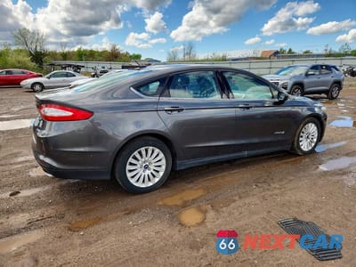 Trzecie zdjęcie samochodu z tyłu: 2015 FORD FUSION S HYBRID VIN:3FA6P0UU0FR150031 - miniatura
