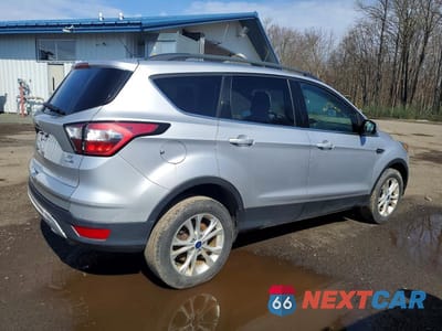 Trzecie zdjęcie samochodu z tyłu: 2018 FORD ESCAPE SE VIN:1FMCU9GD8JUC88788 - miniatura
