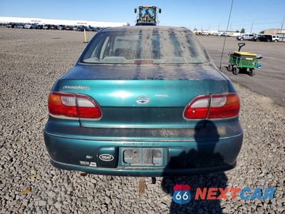 Zdjęcie 6 z 12 samochodu: 1999 CHEVROLET MALIBU VIN:1G1ND52J0XY141913 - miniatura