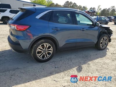 Trzecie zdjęcie samochodu z tyłu: 2020 FORD ESCAPE SEL VIN:1FMCU9H65LUC37672 - miniatura