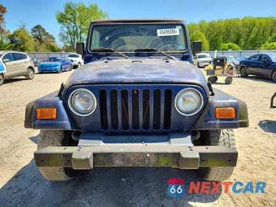 Piąte zdjęcie samochodu w środku: 2000 JEEP WRANGLER / TJ SPORT VIN:1J4FA49SXYP751820 - miniatura