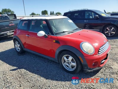 Czwarte zdjęcie samochodu z boku: 2011 MINI COOPER VIN:WMWSU3C51BT092921 - miniatura
