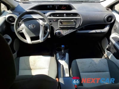 Zdjęcie 8 z 12 samochodu: 2014 TOYOTA PRIUS C TWO VIN:JTDKDTB30E1571186 - miniatura