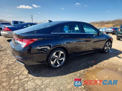 Trzecie zdjęcie samochodu z tyłu: 2023 HYUNDAI ELANTRA HYBRID LIMITED VIN:KMHLN4AJ6PU052342 - miniatura