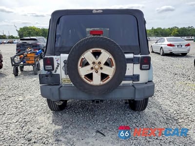 Zdjęcie 6 z 11 samochodu: 2011 JEEP WRANGLER SPORT VIN:1J4AA2D14BL529446 - miniatura