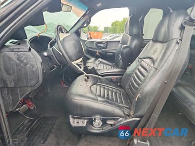 Zdjęcie 7 z 13 samochodu: 2000 FORD F150 VIN:2FTRX07L2YCB02326 - miniatura