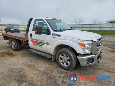 Czwarte zdjęcie samochodu z boku: 2014 FORD F350 SUPER DUTY VIN:1FDBF3ET4EEB35967 - miniatura