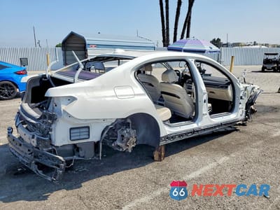 Trzecie zdjęcie samochodu z tyłu: 2021 BMW 740 I VIN:WBA7T2C07MCF88819 - miniatura