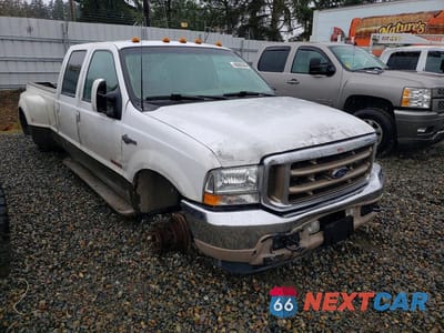 Czwarte zdjęcie samochodu z boku: 2003 FORD F350 SUPER DUTY VIN:1FTWW33P53EC24939 - miniatura