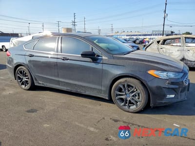 Czwarte zdjęcie samochodu z boku: 2019 FORD FUSION SE VIN:3FA6P0HD0KR177394 - miniatura