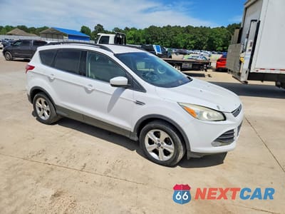 Czwarte zdjęcie samochodu z boku: 2016 FORD ESCAPE SE VIN:1FMCU9G96GUC13754 - miniatura