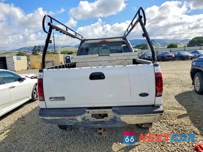 Zdjęcie 6 z 13 samochodu: 2001 FORD F250 SUPER DUTY VIN:1FTNX21F21EA55389 - miniatura