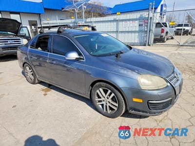 Czwarte zdjęcie samochodu z boku: 2006 VOLKSWAGEN JETTA TDI OPTION PACKAGE 1 VIN:3VWST71K26M766744 - miniatura