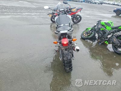 Czwarte zdjęcie samochodu z boku: 2013 HONDA NC700X VIN:JH2RC6357DK101241 - miniatura