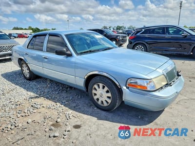 Czwarte zdjęcie samochodu z boku: 2003 MERCURY GRAND MARQUIS LS VIN:2MEFM75W83X664958 - miniatura