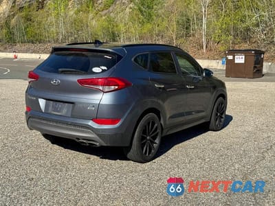 Czwarte zdjęcie samochodu z boku: 2016 HYUNDAI TUCSON LIMITED VIN:KM8J3CA23GU217084 - miniatura