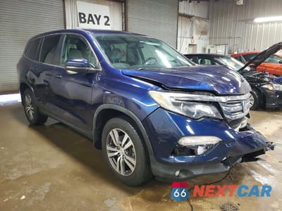 Czwarte zdjęcie samochodu z boku: 2016 HONDA PILOT EXLN VIN:5FNYF6H7XGB115514 - miniatura