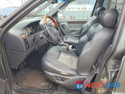 Zdjęcie 7 z 11 samochodu: 2004 JEEP GRAND CHEROKEE OVERLAND VIN:1J8GW68J84C216009 - miniatura