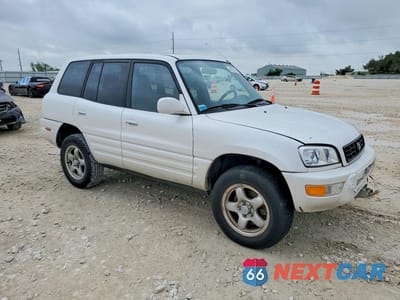 Czwarte zdjęcie samochodu z boku: 1999 TOYOTA RAV4 BASE VIN:JT3HP10V1X7137650 - miniatura