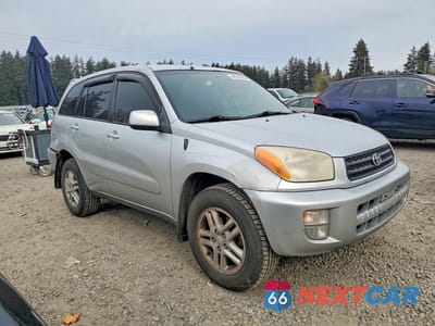 Czwarte zdjęcie samochodu z boku: 2002 TOYOTA RAV4 BASE VIN:JTEHH20V226045410 - miniatura