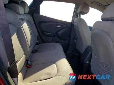 Zdjęcie 11 z 13 samochodu: 2014 HYUNDAI TUCSON GLS VIN:KM8JT3AF1EU790324 - miniatura