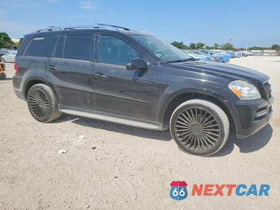Czwarte zdjęcie samochodu z boku: 2012 MERCEDES-BENZ GL 450 4MATIC VIN:4JGBF7BE3CA763634 - miniatura