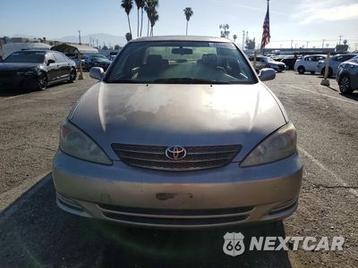 Piąte zdjęcie samochodu w środku: 2002 TOYOTA CAMRY LE VIN:JTDBE32K520051099 - miniatura