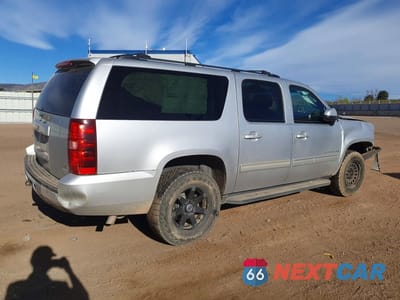 Trzecie zdjęcie samochodu z tyłu: 2012 CHEVROLET SUBURBAN K1500 LS VIN:1GNSKHE74CR326737 - miniatura