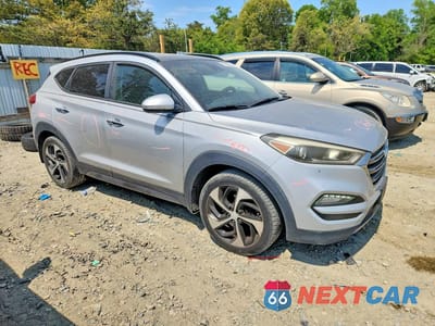 Czwarte zdjęcie samochodu z boku: 2016 HYUNDAI TUCSON LIMITED VIN:KM8J33A21GU208724 - miniatura