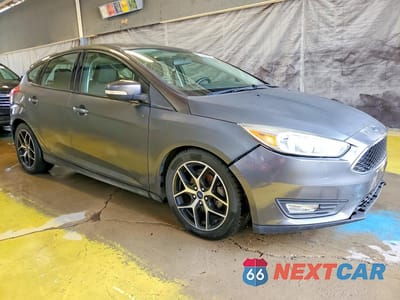 Czwarte zdjęcie samochodu z boku: 2017 FORD FOCUS SEL VIN:1FADP3M27HL265248 - miniatura