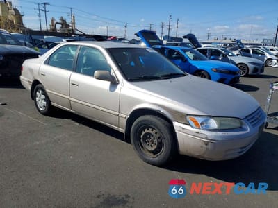 Czwarte zdjęcie samochodu z boku: 1999 TOYOTA CAMRY CE VIN:4T1BG22KXXU516749 - miniatura