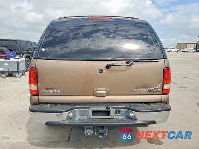 Zdjęcie 6 z 13 samochodu: 2003 GMC YUKON VIN:1GKEC13Z73R123795 - miniatura