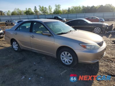 Czwarte zdjęcie samochodu z boku: 2002 TOYOTA CAMRY LE VIN:4T1BE32K92U016070 - miniatura