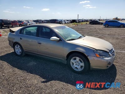 Czwarte zdjęcie samochodu z boku: 2003 NISS ALTIMA S MANUAL VIN:1N4AL11D43C322796 - miniatura