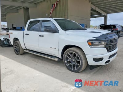 Czwarte zdjęcie samochodu z boku: 2023 RAM 1500 BIG HORN VIN:1C6SRFFT1PN581452 - miniatura