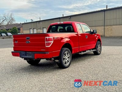 Czwarte zdjęcie samochodu z boku: 2014 FORD F150 SUPER CAB VIN:1FTEX1EM7EFC80815 - miniatura