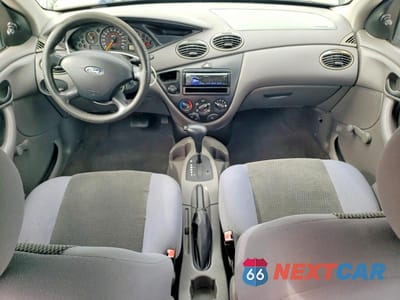Zdjęcie 8 z 12 samochodu: 2004 FORD FOCUS LX VIN:1FAHP33Z94W136694 - miniatura
