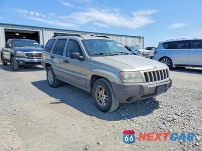 Czwarte zdjęcie samochodu z boku: 2004 JEEP GRAND CHEROKEE LAREDO VIN:1J4GW48S94C269140 - miniatura