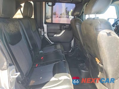 Zdjęcie 11 z 12 samochodu: 2013 JEEP WRANGLER UNLIMITED SPORT VIN:1C4HJWDG3DL591052 - miniatura