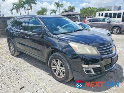 Czwarte zdjęcie samochodu z boku: 2016 CHEVROLET TRAVERSE LT VIN:1GNKRGKD6GJ177980 - miniatura