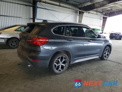 Trzecie zdjęcie samochodu z tyłu: 2018 BMW X1 XDRIVE28I VIN:WBXHT3C30J5K31053 - miniatura