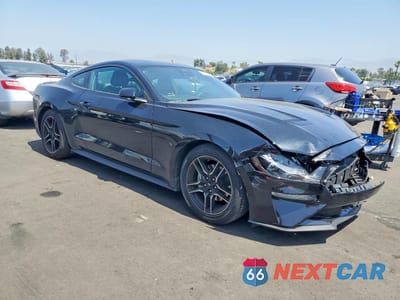 Czwarte zdjęcie samochodu z boku: 2022 FORD MUSTANG VIN:1FA6P8THXN5129403 - miniatura