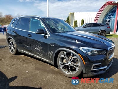 Czwarte zdjęcie samochodu z boku: 2023 BMW X5 XDRIVE45E VIN:5UXTA6C08P9P84991 - miniatura