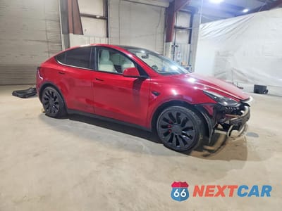 Czwarte zdjęcie samochodu z boku: 2023 TESLA MODEL Y VIN:7SAYGDEF3PF586100 - miniatura
