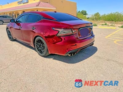 Trzecie zdjęcie samochodu z tyłu: 2021 NISSAN MAXIMA SV VIN:1N4AA6CV1MC504806 - miniatura